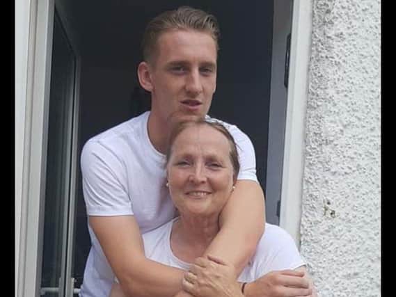 Pompey winger Ronan Curtis with his mum Marie