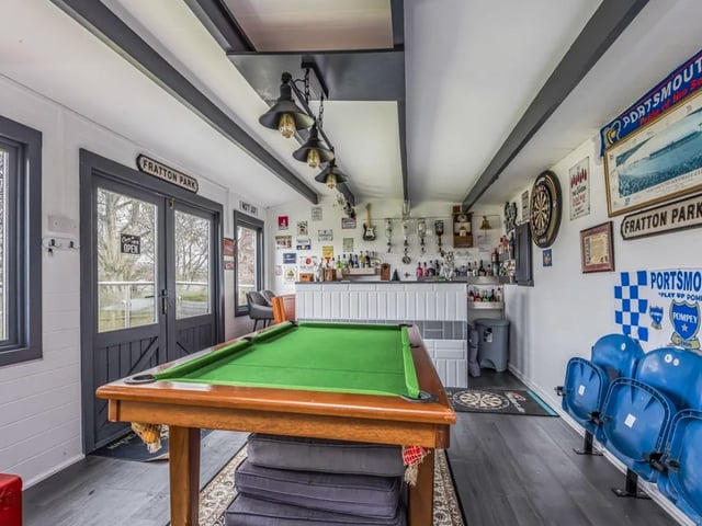 This property comes with four bedrooms, two bathrooms and two reception rooms as well as a number of hidden luxuries.