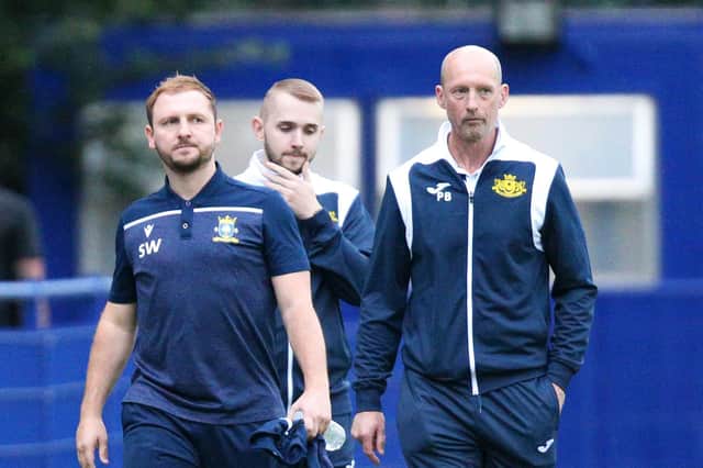 Baffins manager Shaun Wilkinson, second left. 
Picture: Chris Moorhouse