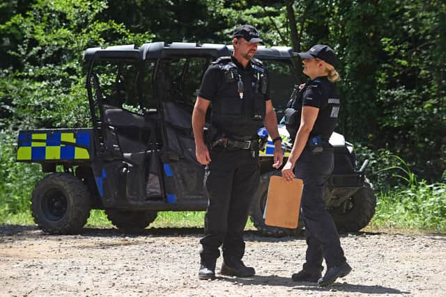 Police at the scene of Havant Thicket where the body of Louise Smith was found. Picture: Simon Czapp/Solent News & Photo Agency