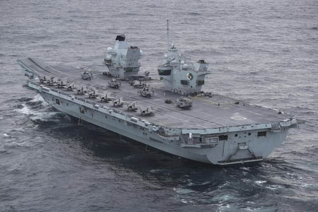 HMS Queen Elizabeth pictured with F-35B stealth jets on her flight deck. Photo: LPhot Belinda Alker