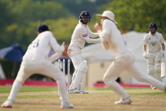 Hampshire's Ian Holland is caught behind by  Sam Robson during day two of The Bob Willis Trophy match at Radlett. Pic: John Walton.