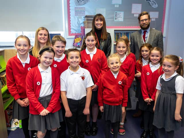Teacher Charley Poolton with Emma Barton and headteacher Ashley Howard together with children from the Pupil's Parliament at Highbury Primary. Picture: Mike Cooter (051121)