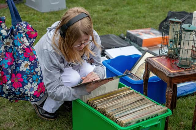 Hunting for vinyl bargains at the car boot sale. Picture: Mike Cooter (020423)