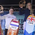 Ellie Aldridge atop the podium on Eastney Beach after winning the female European kitefoil championship title. Picture by Lloyd Images