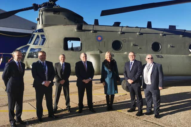 Caroline Dinenage and defence secretary Ben Wallace meet with staff from StandardAero.