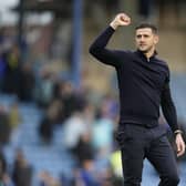 Pompey head coach John Mousinho celebrates the win over Carlisle today. Pic: Jason Brown.