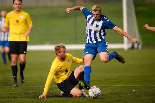 Burrfields (yellow) v Wickham Dynamos. Picture: Keith Woodland