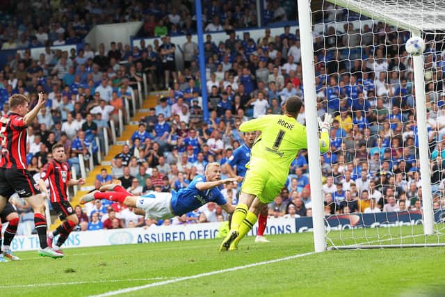 Jayden Stockley heads home the equaliser against Morecambe in August 2015. Picture: Joe Pepler