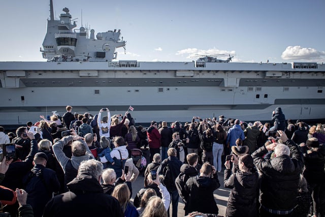 Portsmouth has a rich naval history and continues to be important for the Royal Navy today. Pictured are people waving goodbye to the HMS Prince of Wales, a Royal Navy aircraft carrier, as she leaves Portsmouth. Picture: Habibur Rahman