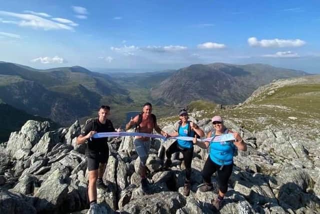 Two fundraising events have given a huge boost to charity Hannah's Holiday Home. Pictured: Dan Till, Lea Jackson, Leanne Bushnell, Vicky Frost on the top of their final summit