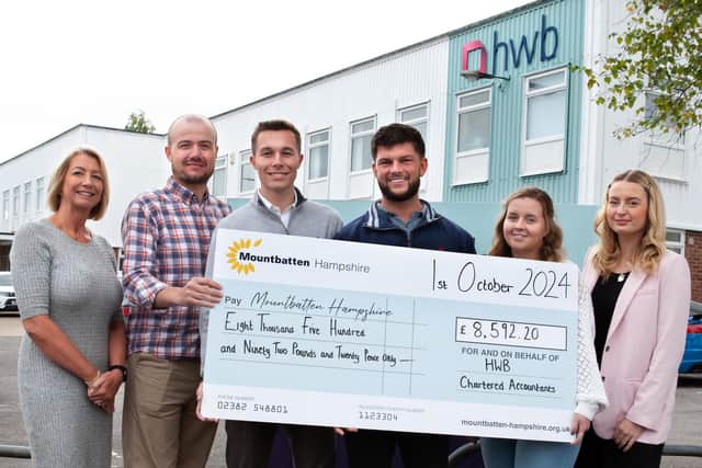 CHEQUE POINT: Presenting the proceeds of HWB’s fundraising activities to Caitlyn Sherry, of Mountbatten Hampshire, right, are, from left: HWB Managing Director Tracy Jenkins; skydiver Matt Cooper; Chris Ellison who ran the Southampton marathon; Ben Forster, part of the Tough Mudder team, and Zoe Handley-Greaves who did a skydive last year