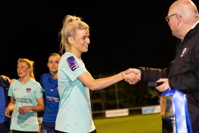 Portsmouth players receive their winners medals. Picture by Alex Shute