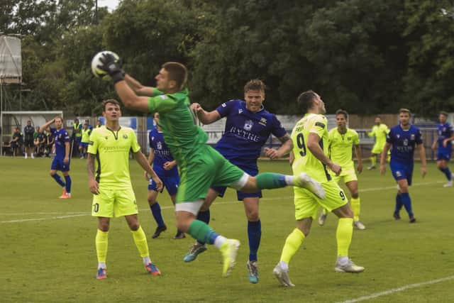Baffins Milton Rovers goalkeeper Konrad Syzmaniak comes to collect the ball. Picture: Mike Cooter (270721)