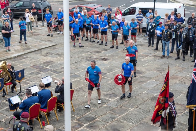 Members of the Falklands 40 Cyclists prepare to lay wreaths at the Falklands Memorial Service at Old Portsmouth.