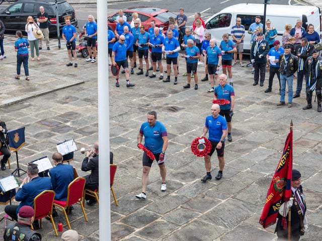 Members of the Falklands 40 Cyclists prepare to lay wreaths at the Falklands Memorial Service at Old Portsmouth.