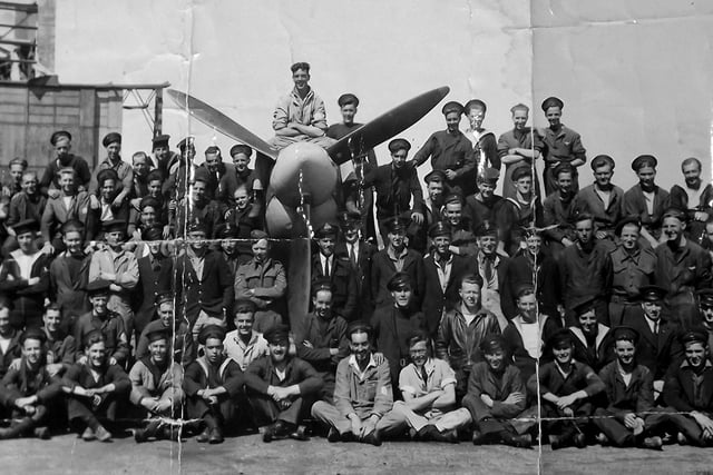 MS Daedalus 1944, men of the Fleet Air Arm pose on a Seafire the sea-going Spitfire May 1944