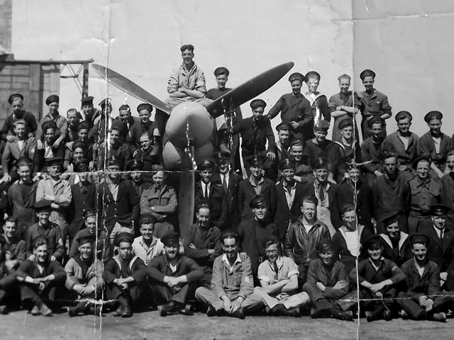 MS Daedalus 1944, men of the Fleet Air Arm pose on a Seafire the sea-going Spitfire May 1944