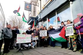 Members of the PSC outside the office of Stephen Morgan MP.