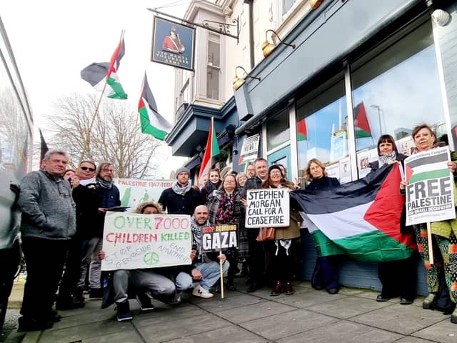 Members of the PSC outside the office of Stephen Morgan MP.