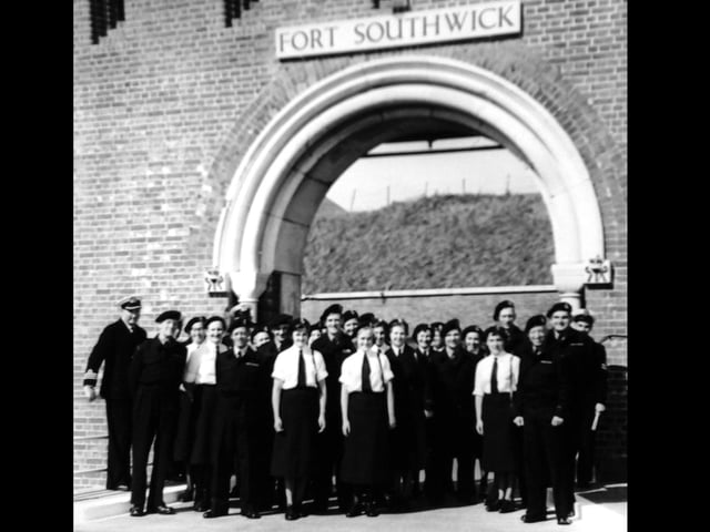 Wrens outside Fort Southwick in 1956. Duty Wrens pose outside Fort Southwick with their C/O Commander Titheridge.