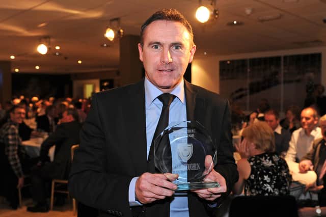 Alan McLoughlin with his award after being inducted into the Pompey Hall of Fame in 2011. Picture: Picture: Ian Hargreaves