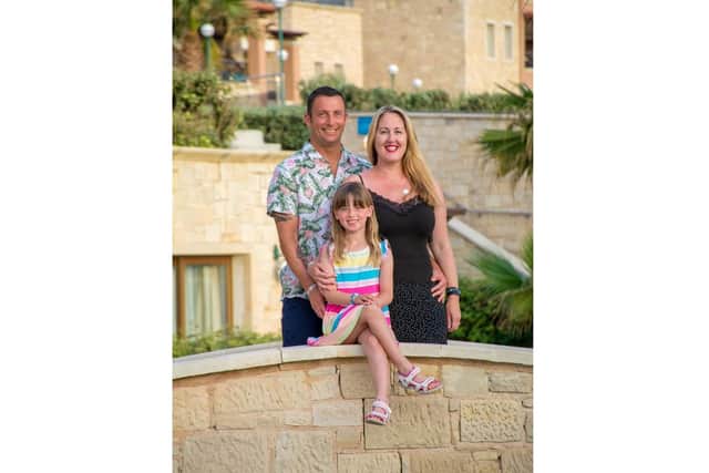 Chris Coyne with his wife Lauren and daughter Izabella, seven. Chris is raising money for Queen Alexandra Hospital by changing his middle name by deed poll to Joe Exotic, after the Tiger King star.
