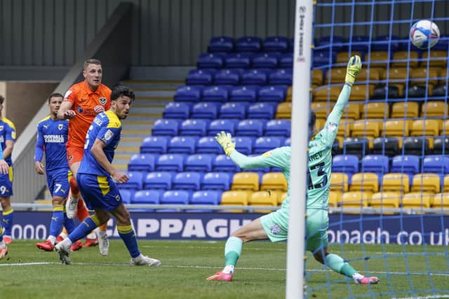 Lee Brown grabs his second goal - and Pompey's third - in their crucial 3-1 triumph at AFC Wimbledon on Saturday. Picture: Jason Brown/ProSportsImages