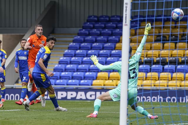 Lee Brown grabs his second goal - and Pompey's third - in their crucial 3-1 triumph at AFC Wimbledon on Saturday. Picture: Jason Brown/ProSportsImages