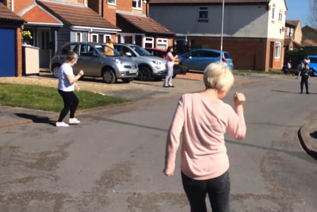 Residents in Corby Crescent, Anchorage Park, have been dancing in their street - while maintaining the social distancing guidelines.