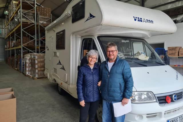 Laura Rice and her husband Ken with Molly the motorhome Picture: Laura Rice/PA Wire