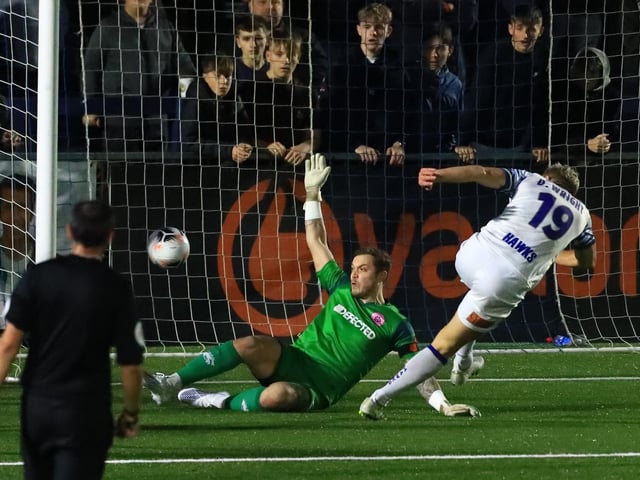 Danny Wright scores the first of his two goals. Picture by Dave Haines.