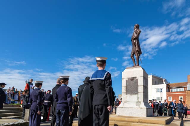 Guests gathered at the statue of Admiral Lord Nelson in Old Portsmouth. Picture: Mike Cooter (021022)