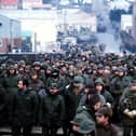 Argentine prisoners of war massed in Port Stanley, capital of the Falkland Islands, after their surrender to the British Falkland Islands Task ForcePicture: PA Wire.