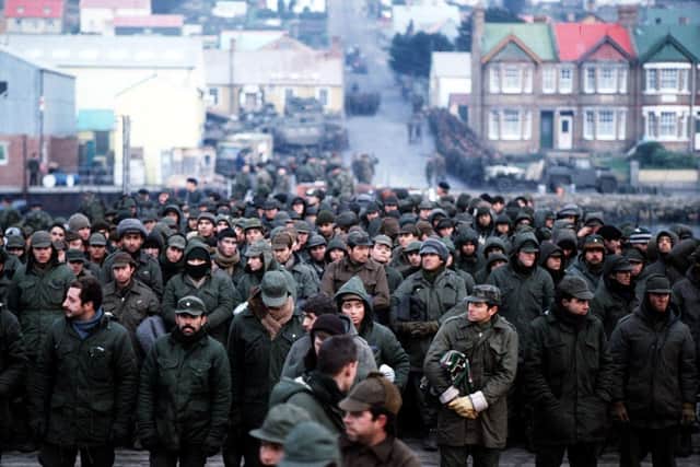 Argentine prisoners of war massed in Port Stanley, capital of the Falkland Islands, after their surrender to the British Falkland Islands Task ForcePicture: PA Wire.