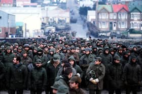 Argentine prisoners of war massed in Port Stanley, capital of the Falkland Islands, after their surrender to the British Falkland Islands Task ForcePicture: PA Wire.