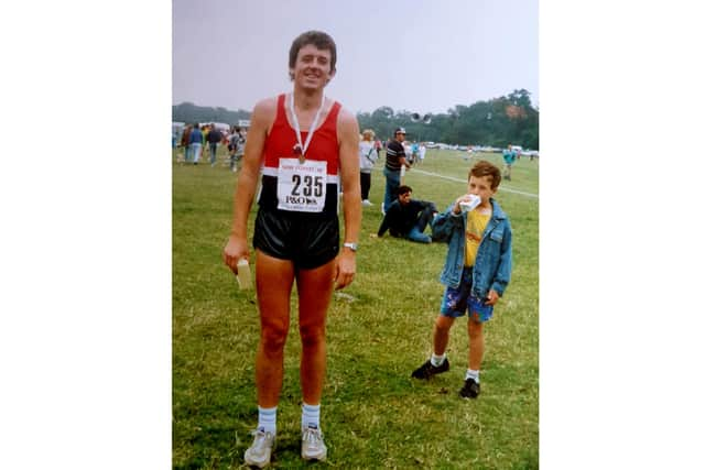 Craig with his father at one of his races.