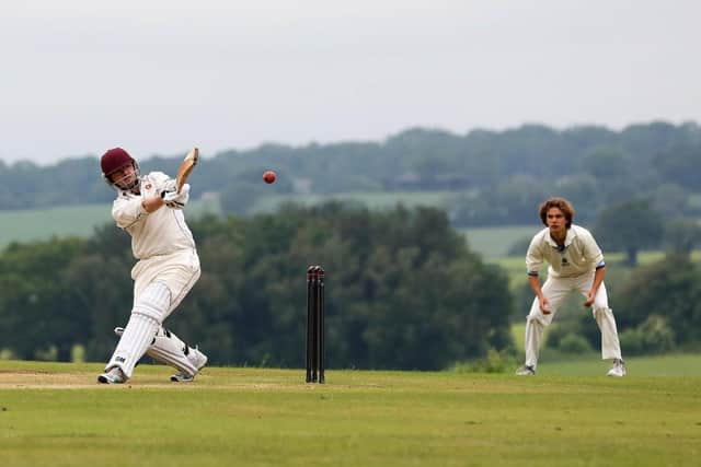 Havant 3rds batsman Julian Atkins hits out at Hambledon 3rds. Picture: Sam Stephenson