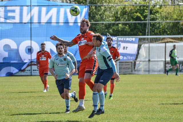 Makeshift striker Sam Pearce in action against Petersfield Town. Picture: Daniel Haswell.