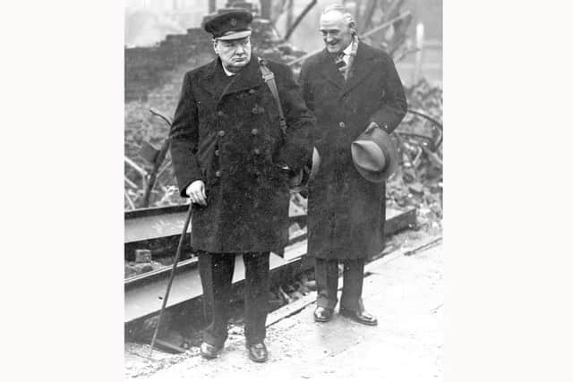 On January 31, 1941, prime minister Winston Churchill visited Portsmouth to see bomb damage first hand. Here he is with lord mayor Denis Daly. Picture: Pat Daly collection