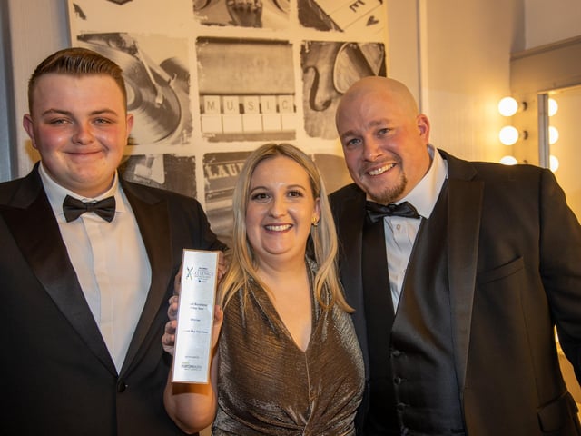 Small Business of the Year winners, Michael and Sara Woods and James Taylor of Solent Sky Services.
