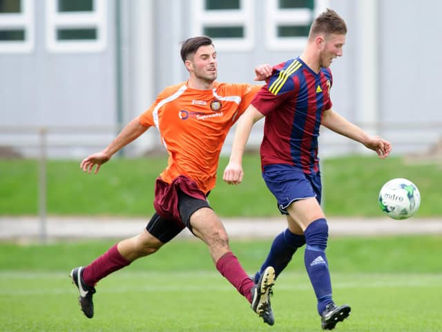 Flashback - Connor Duffin, right, in action for US Portsmouth against New Milton in October 2015. Picture: Allan Hutchings
