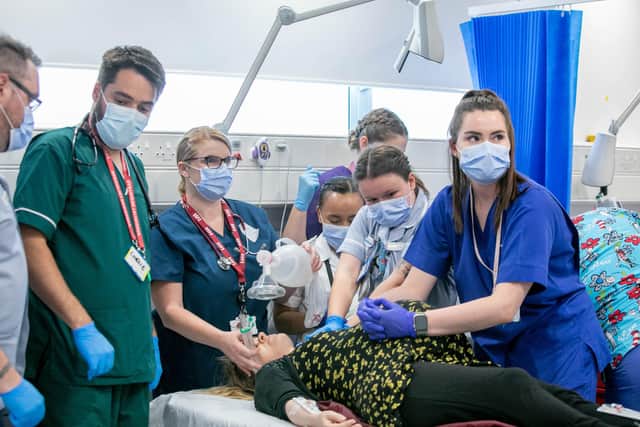 Pictured: An actor playing a pregnant woman being treated at the makeshift hospital at St Andrews Court, Portsmouth
Picture: Habibur Rahman
