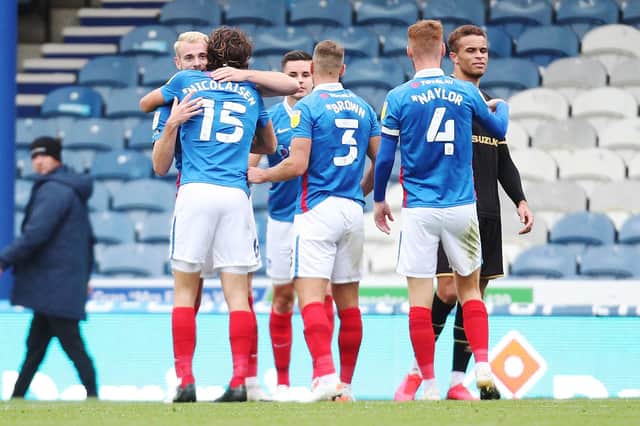 Pompey celebrate their win over MK Dons. Picture: Joe Pepler