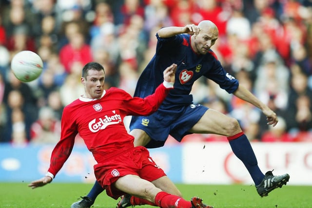 Jamie Carragher battles with Ivica Mornar drawing a 1-1 draw at Anfield in the FA Cup Fifth Round in February 2004. Picture: Laurence Griffiths/Getty Images