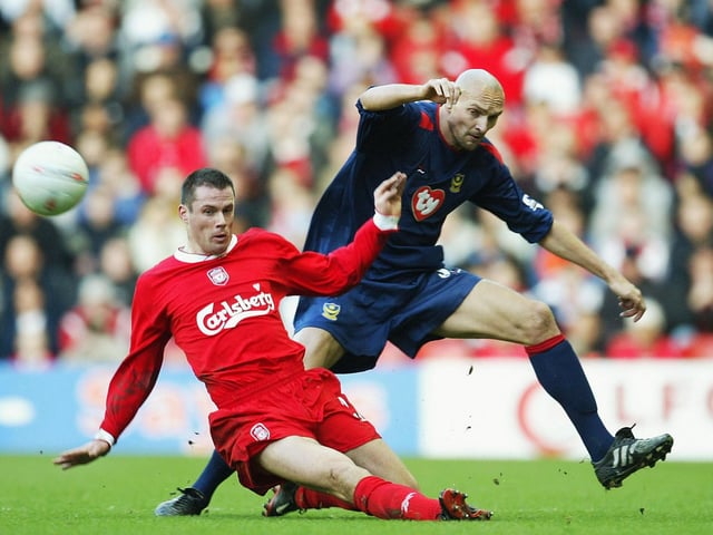 Jamie Carragher battles with Ivica Mornar drawing a 1-1 draw at Anfield in the FA Cup Fifth Round in February 2004. Picture: Laurence Griffiths/Getty Images