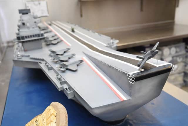 David Duncan and his staff at 3D Cakes at Roseburn, Edinburgh have created an 8ft scale replica cake of the HMS Queen Elizabeth which was driven down to Portsmouth today and presented to the Queen at the commissioning ceremony of the HMS Queen Elizabeth in 2017. Picture: Greg Macvean