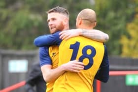 Ryan Woodford, left, celebrates his winner at Beaconsfield. Picture: Martyn White