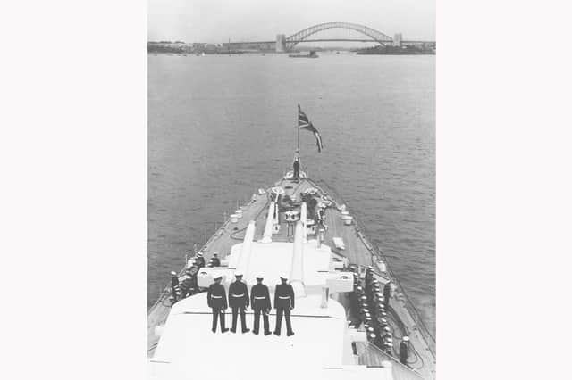 HMS Sussex approaches Sydney Harbour bridge in 1934. Picture: Andrew August collection