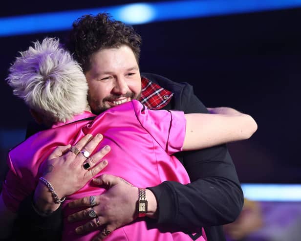 James Newman of United Kingdom reacts to receiving zero points during the 65th Eurovision Song Contest grand final. Photo by Dean Mouhtaropoulos/Getty Images